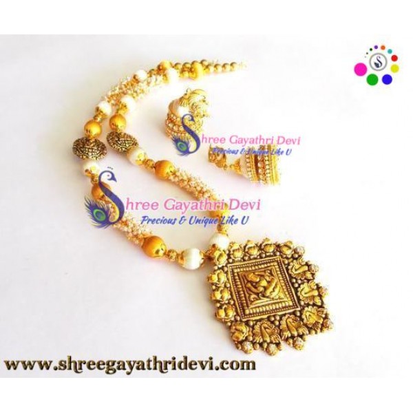 Elegant Goddess Lakshmi Pendant with Pearl loreals,charms Silk Thread Neclace with Dual Jhumka Earrings(Off-white,Mild gold) - SGDCE04